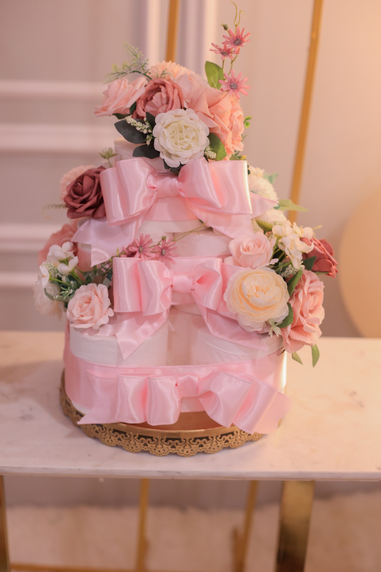 Bridal shower cake of ribbons and roses