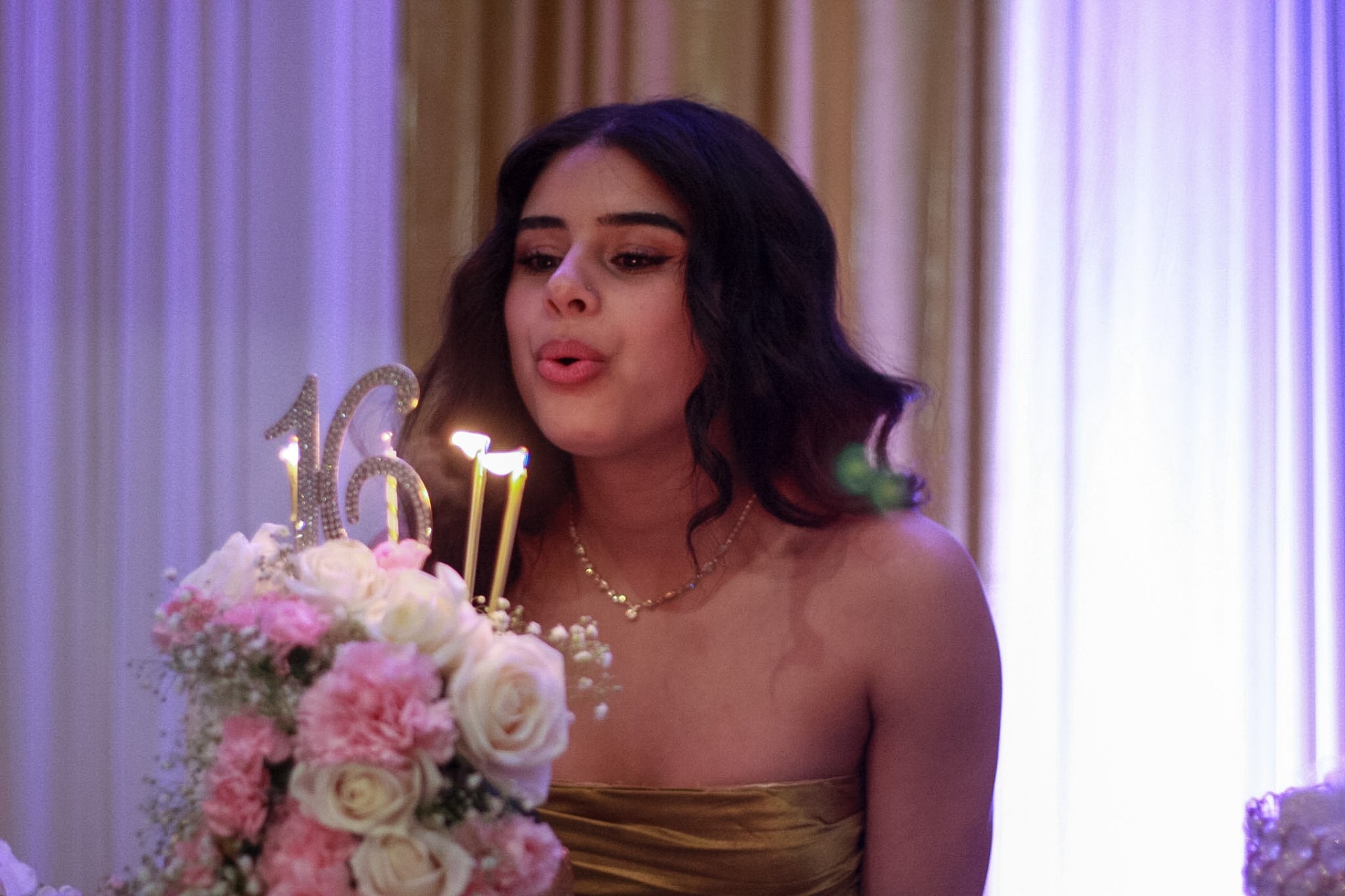 Sarah blowing out her sixteen candles